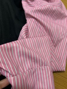 pink off shoulder black dress