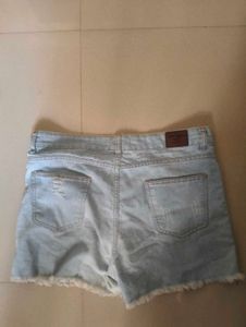 Ripped Denim Shorts