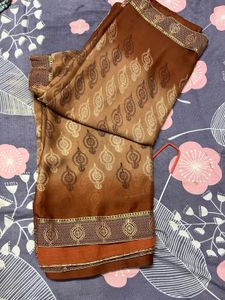 Elegant Brown Patterned Saree