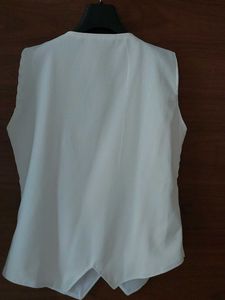 White Sleeveless waistcoat