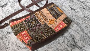Sling Bag With Two Zips