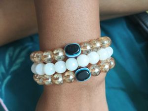 Stack Of 3 Bracelets, 2 Evil Eyes And 1 White