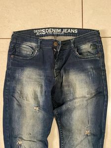 Distressed Denim Jeans