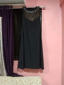 Long Black Gown With Some Design On Neck