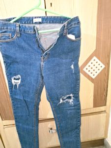 Ripped Blue Denim Jeans