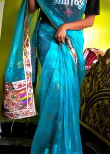 Teal Embellished Net Saree