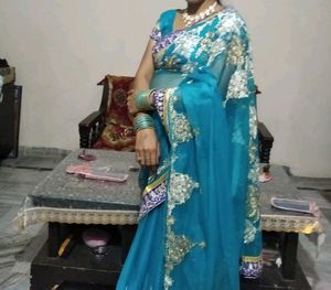 Elegant Teal Embroidered Saree