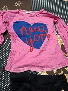 Pink Top And Black Shorts