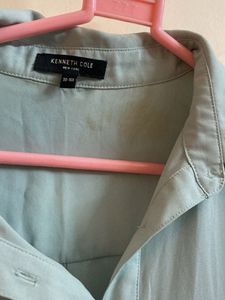 Light Blue Sleeveless Button-Down