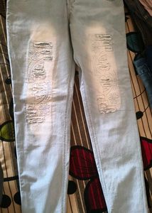 Ripped & Embroidered Light Wash Jeans