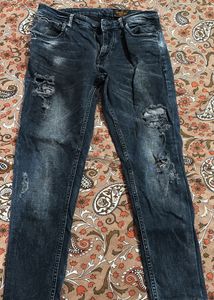Distressed Wash Denim Jeans