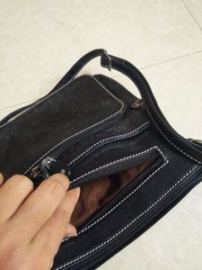 Sling Bag ( Negotiable)