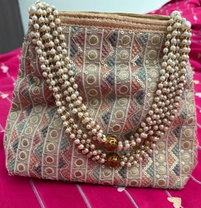 Graceful Ethnic Clutch With Embroidery