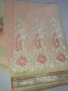 Cream Colour Saree With Light Orange Floral Design
