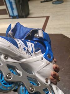 Blue and White Roller Blades