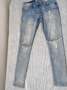 Ripped Knee Denim Jeans