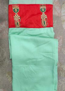 Mint Green Saree & Red stitched Blouse