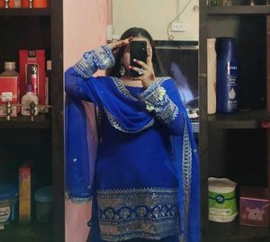 Royal Blue Embroidered sharara suit with dupatta.�