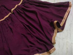 A Beautiful Women Festive Wear Wine Sharara