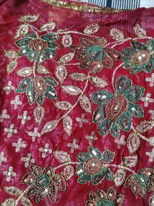 Maroon Sequinned Georgette Heavy Work Saree