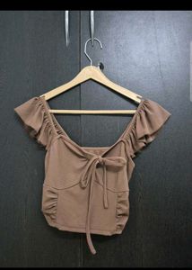 Brown ruffle top