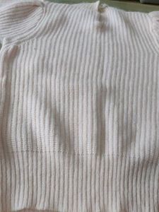 light pink sweater for cozy winters.