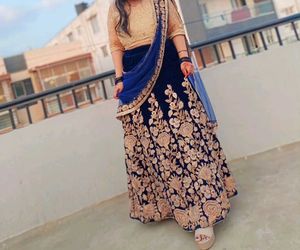 Very Preety Blue And Gold Lehanga Set