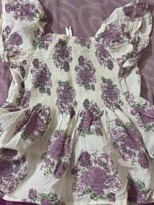 It Is Peplum Top With Rose Print