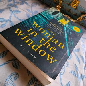 Woman In The Window