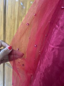 red net gown with pearls