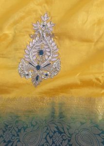 Elegent Yellow Saree With Tale Green Blouse
