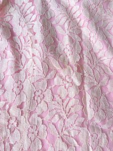 Lace peplum coquette top