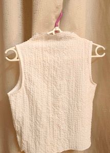 White Sleeveless Top