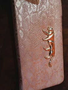 Elegant Pink Clutch with Animal Detail