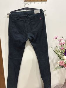 Slight slim fit greenish black jean