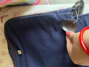 like new from reliance sling bag