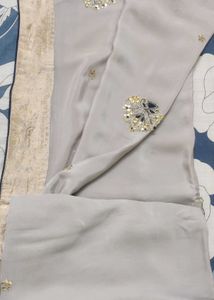 Grey saree with gold border