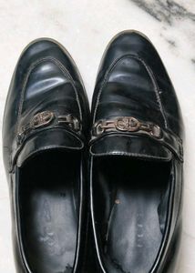 Gucci Shoes And A Pair Of Sports Shoe
