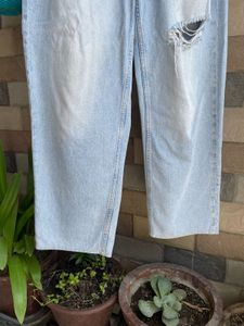 Ripped Light Wash Baggy Jeans