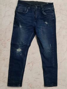 Distressed Blue Denim Jeans