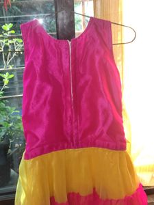 Girls Dress/Frock Yellow And Pink #under500.           It Has A Small But It's Not noticeable