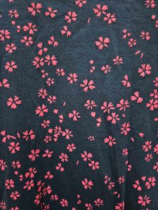 A Navy Blue Shirt With Pink Printed Flowers
