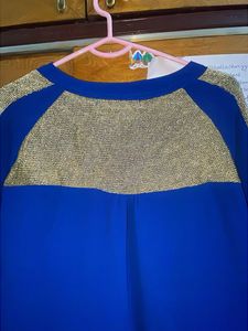 Full Sleeve Blue Top with Gold Detail In Hands