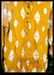 Yellow Printed Top and Black Pant.