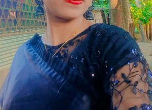 black saree with stiched blouse.