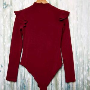 Mock neck long sleeve bodysuit w ruffle shoulder r
