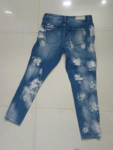 DKNY Ripped Jeans.