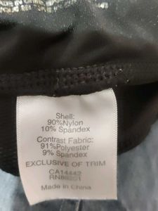 Capri active wear with elastic and drawstrings.