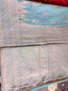 Elegant Aqua Saree with Intricate Paisley Detail