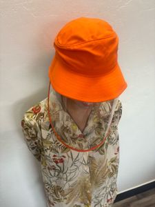 Orange Bucket Hat with Shield
